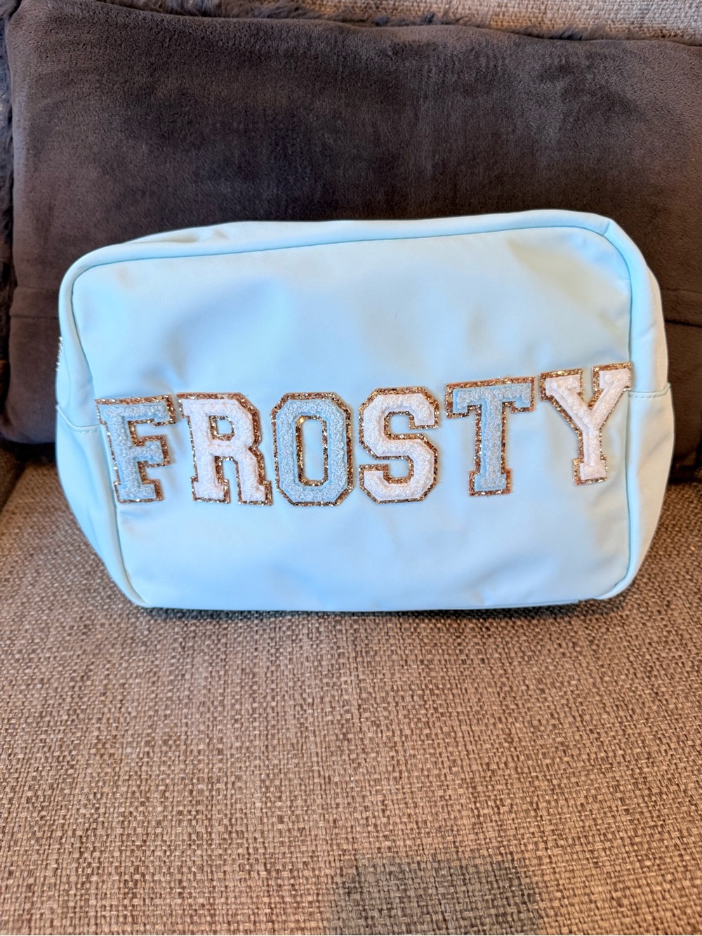 Stoney clover lane large sky pouch with frosty patches sewn on.